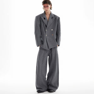 Fashion-forward deconstructed blazer with asymmetrical lapel design, showcasing avant-garde streetwear style