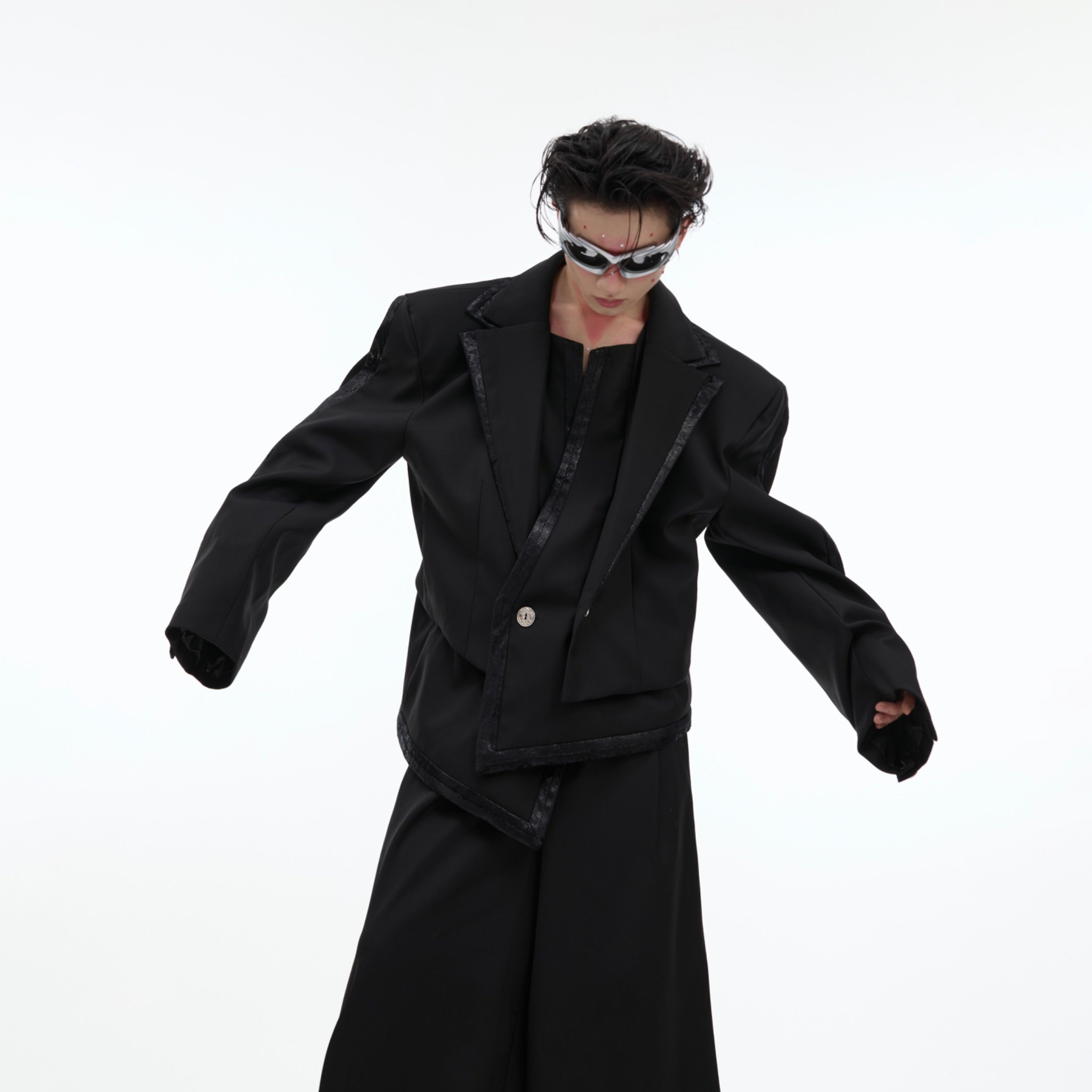 Deconstructed blazer set featuring an oversized jacket with irregular double collar design for avant-garde streetwear look
