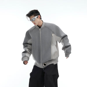 Close-up of ultra-soft suede fabric on this avant-garde deconstructed bomber jacket