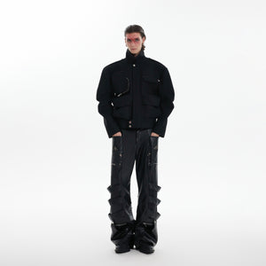 Rear view highlighting the raw edge construction and urban aesthetic of this statement jacket