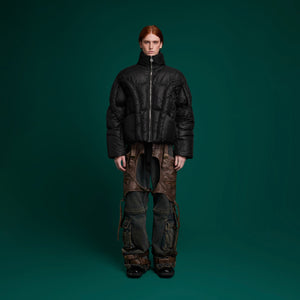 Close-up detail of premium craftsmanship on this oversized puffer jacket for men