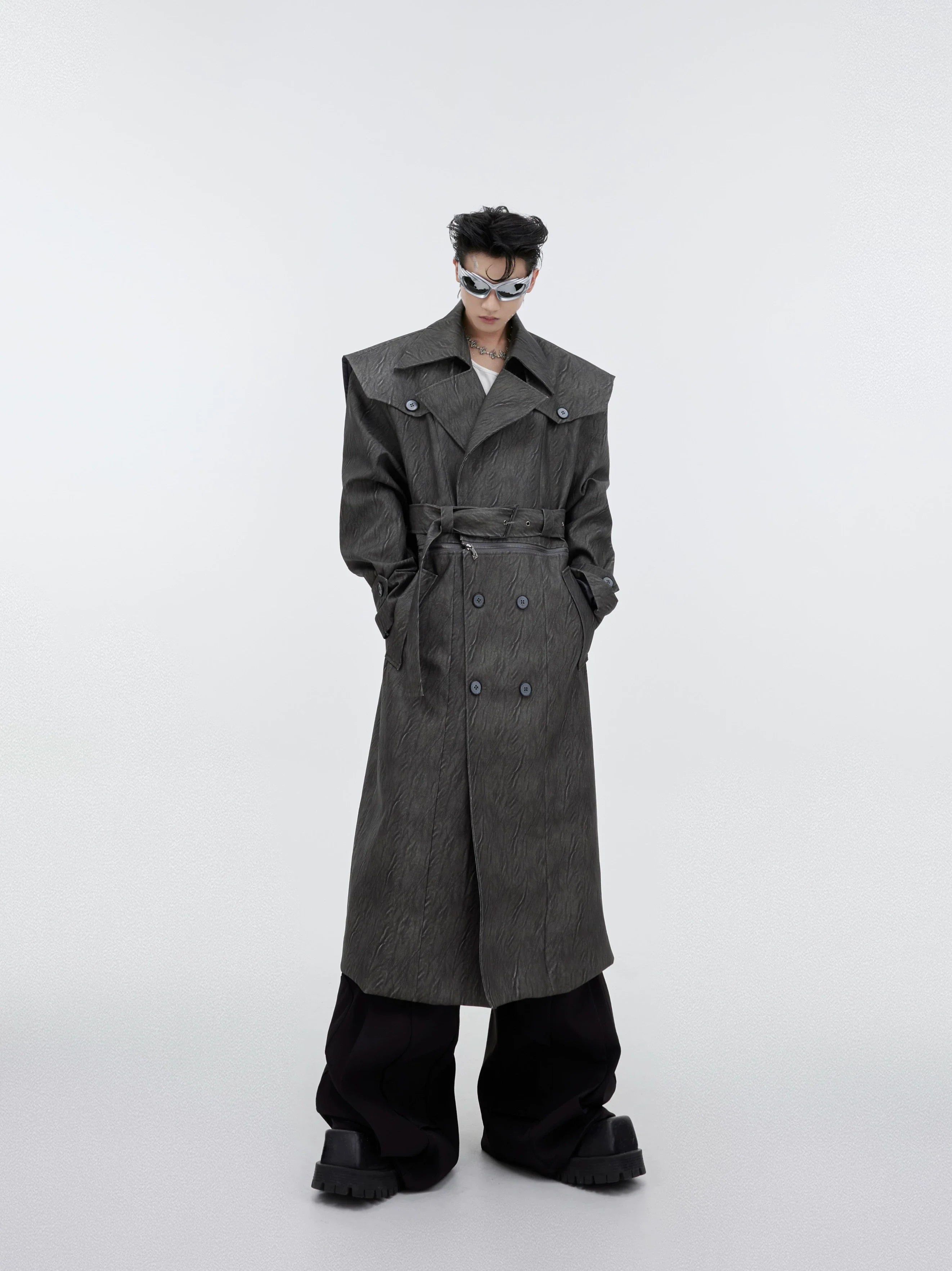 Deconstructed cracked leather trench coat with removable hem for long or short styling options