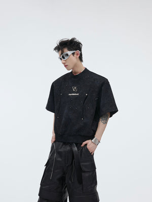 Deconstructed metallic short sleeve tee with star pattern, showing avant-garde streetwear design details