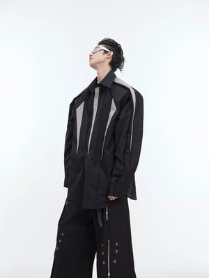 Deconstructed overshirt with unique split-shoulder design and patchwork detailing for avant-garde streetwear style
