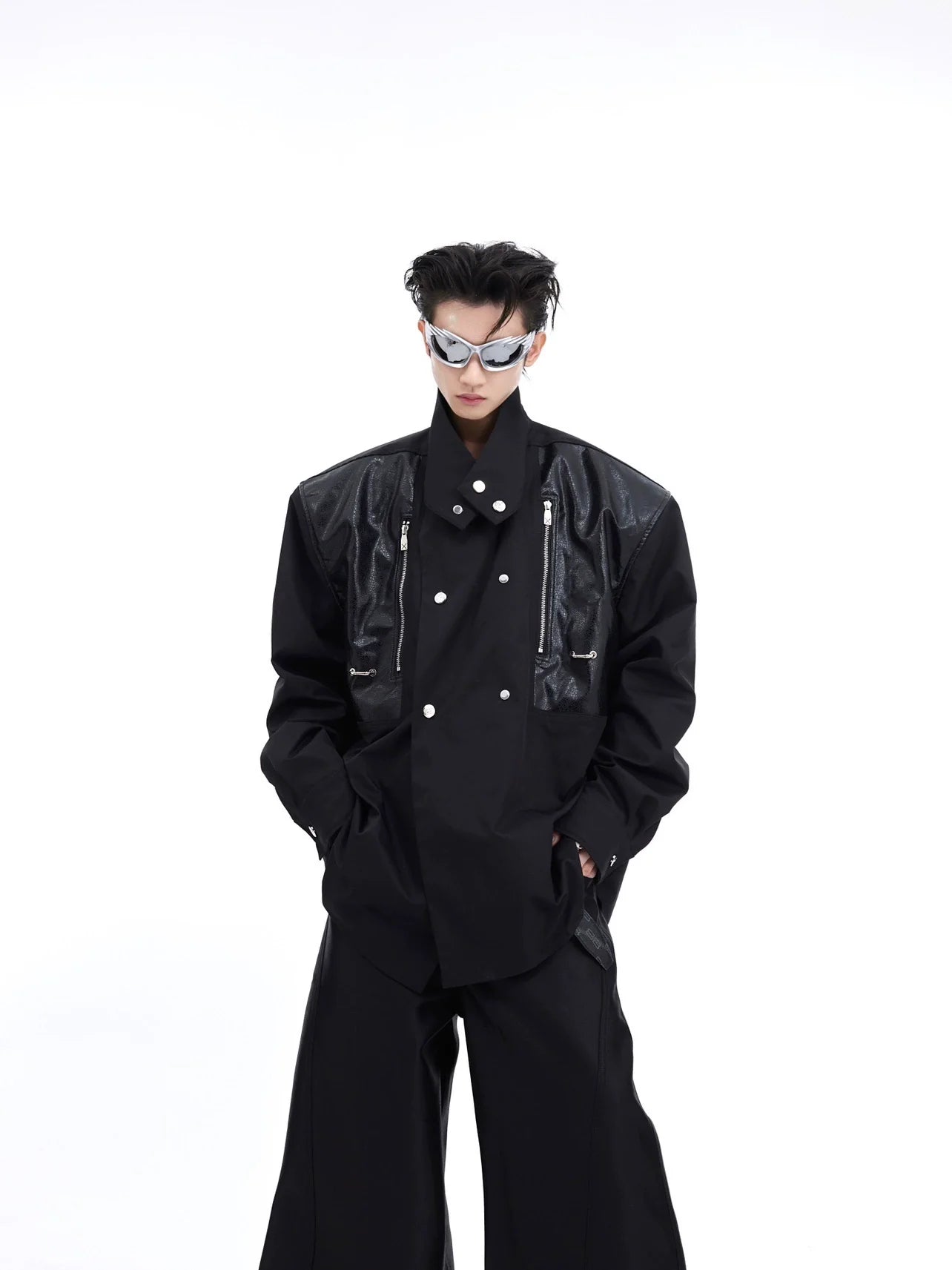 Deconstructed PU leather overshirt with padded shoulders and metal accents, a stylish streetwear button-down shirt