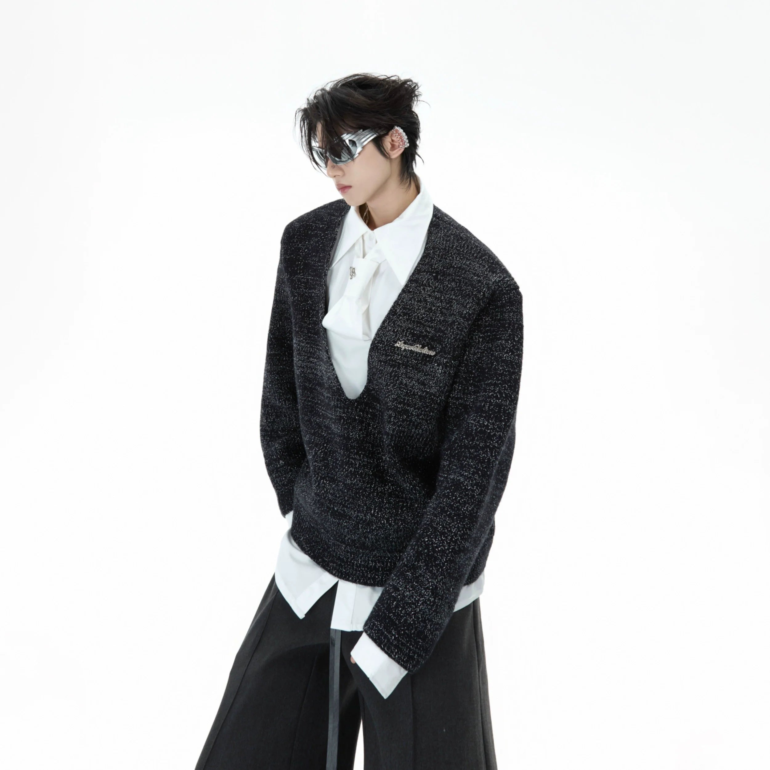 Loose fit deconstructed tie-shirt sweater in streetwear style, featuring a built-in metal tie detail for urban edge