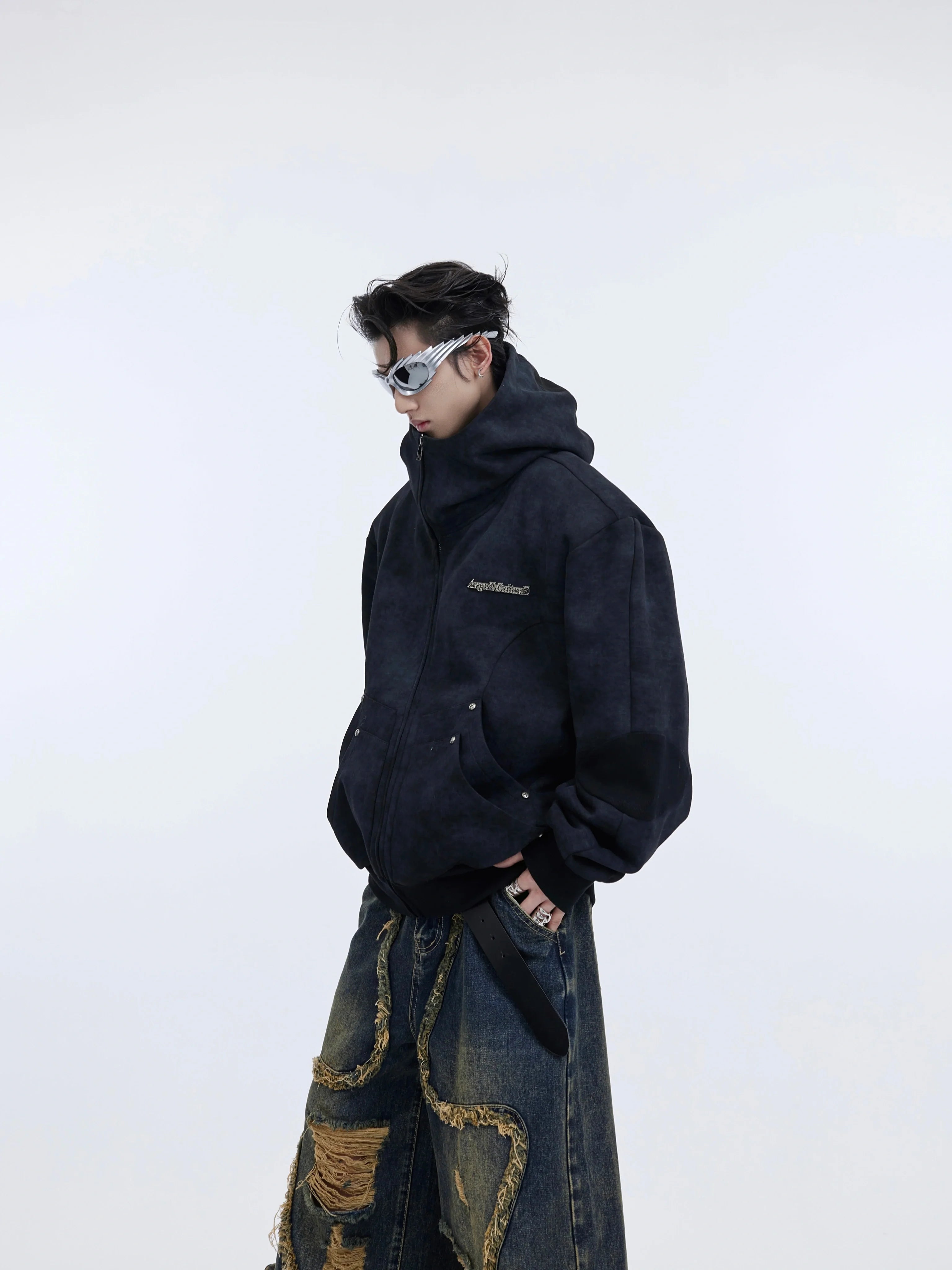 Deconstructed vintage hoodie with distressed metal trim, oversized streetwear style featuring raw edge detailing