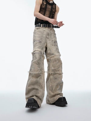 Distressed washed cargo pants with unique tie-dye pattern, showing vintage streetwear style with deconstructed details