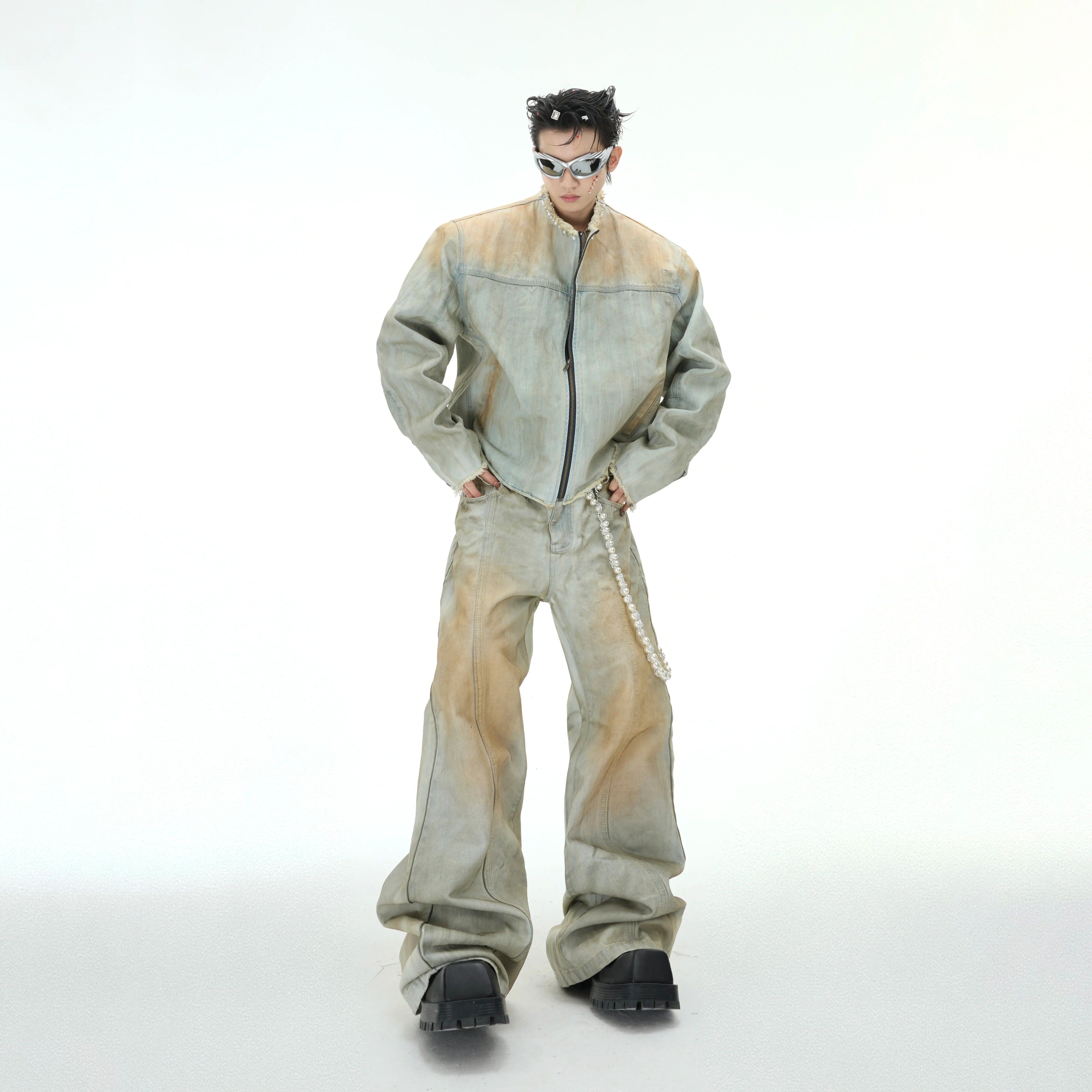 Vintage distressed denim jacket with pearl embellishments, showcasing the unique front design and premium denim texture.