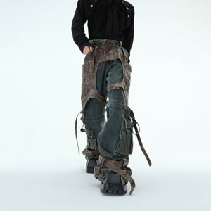 Model wearing deconstructed jeans showing the structured, bold silhouette