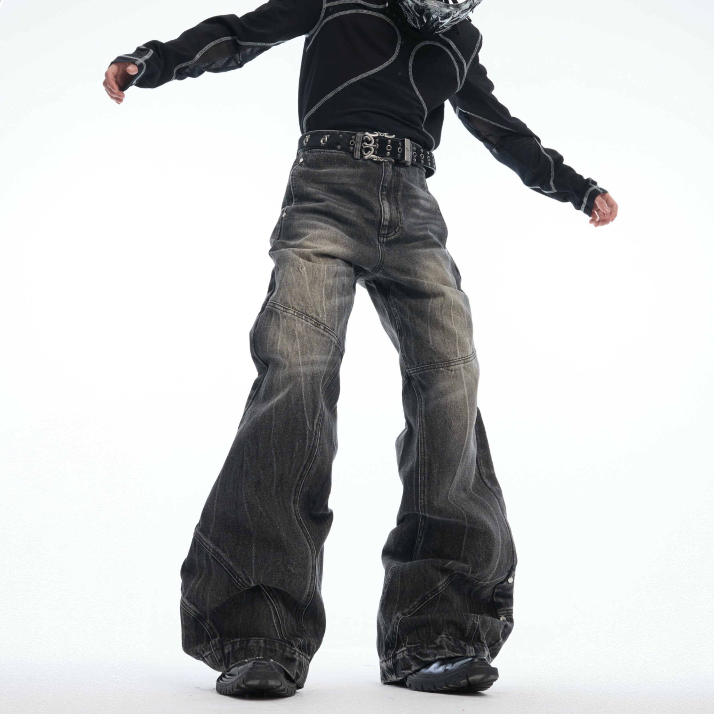 Front view of distressed gray slub jeans showing unique deconstructed details and vintage wash effect