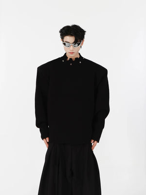 Front view of distressed streetwear sweater with avant-garde shoulder pads and metal accents on premium cotton fabric