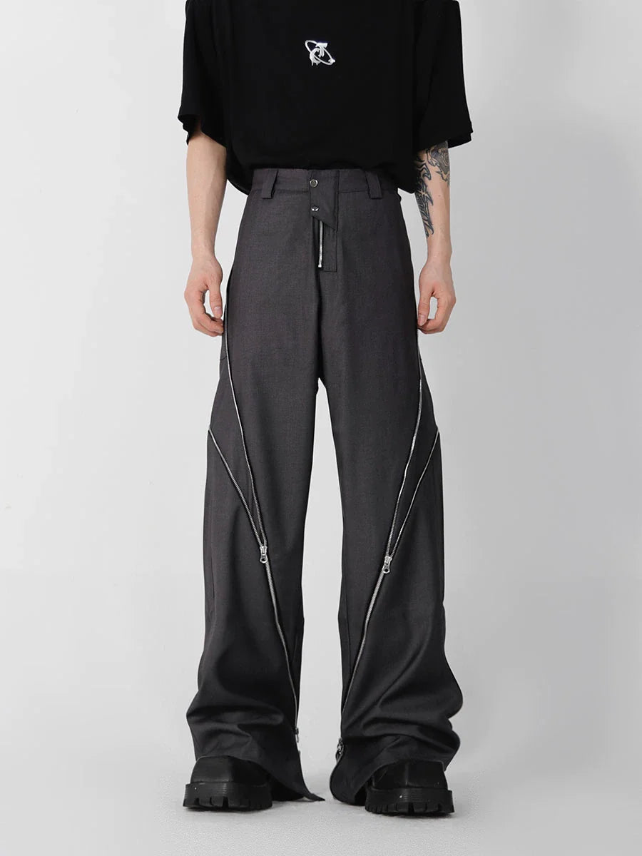 Distressed zip-front flared pants with straight-leg silhouette, showcasing urban streetwear style and premium fabric