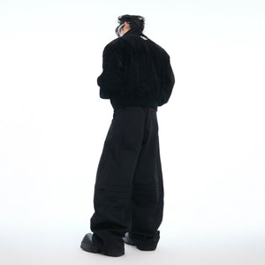 Full-length shot of deconstructed dress pants featuring innovative double waist construction