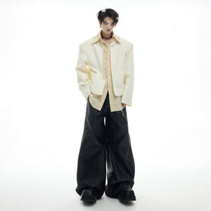 Back view of the striped shirt highlighting the innovative layered construction and streetwear look