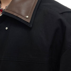 Back view of complete deconstructed PU leather sleeve tee and cargo pants outfit set