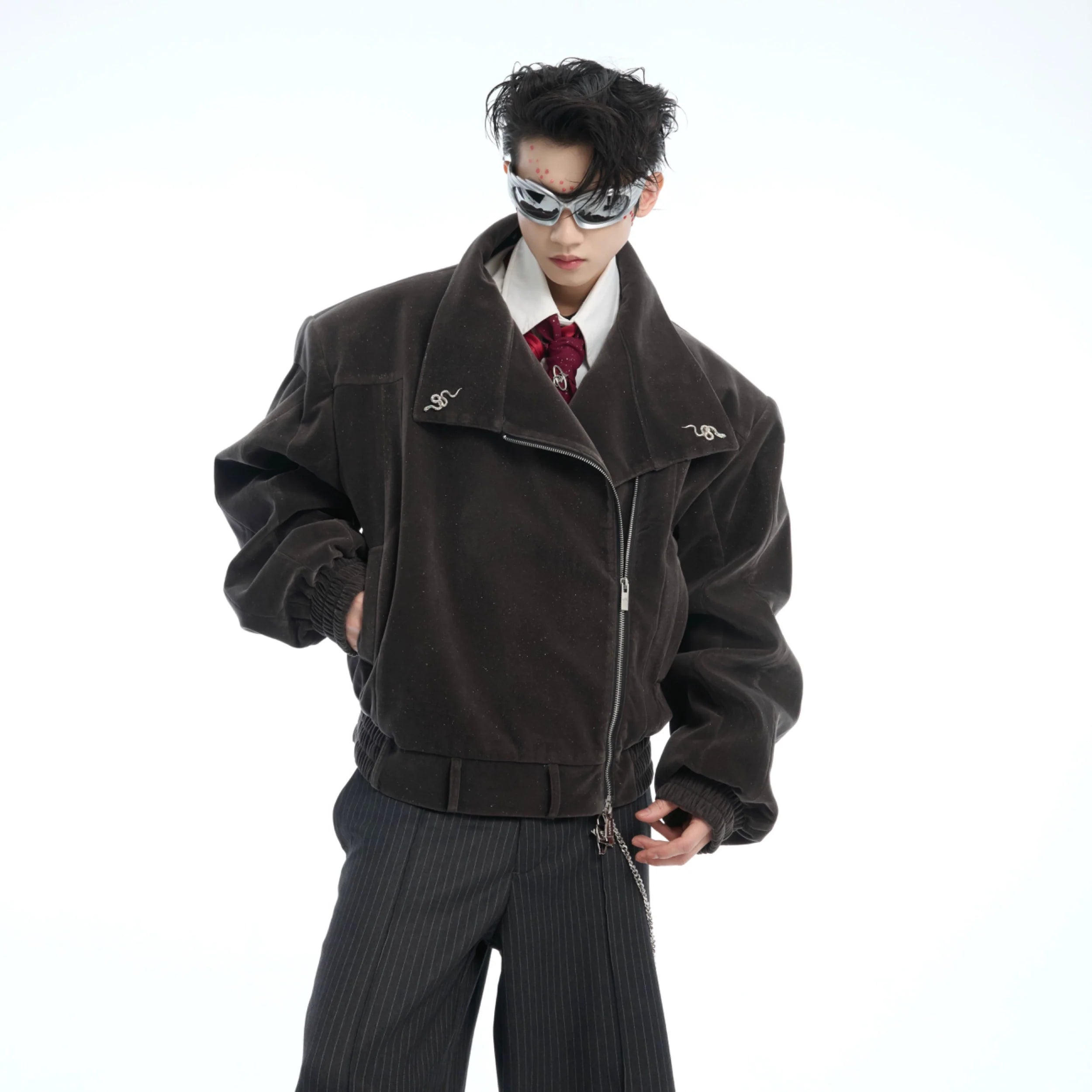 Front view of glitter cropped jacket with striking snake-zipper design, showcasing metallic streetwear style and urban edge