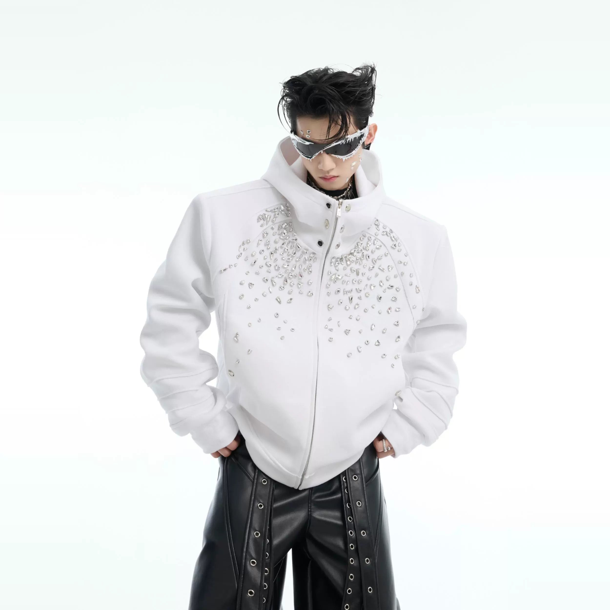 Front view of loose fit glitter-detailed hooded sweatshirt with diamond embellishments for streetwear fashion