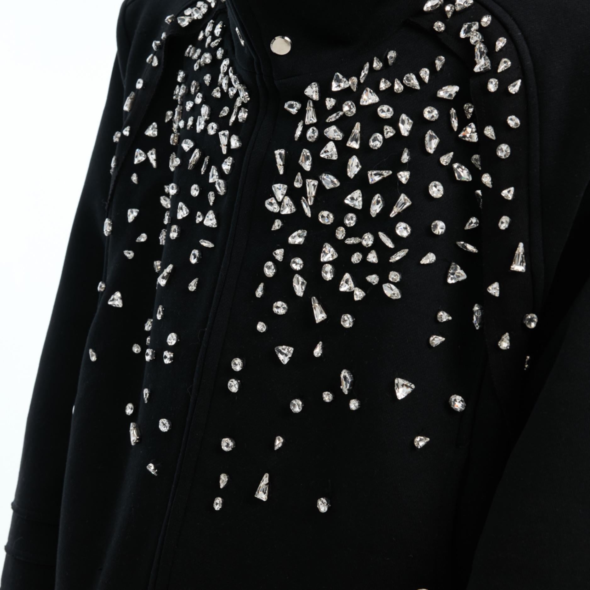 Side angle showing hand-embellished diamond detailing on this trendy oversized spring hoodie