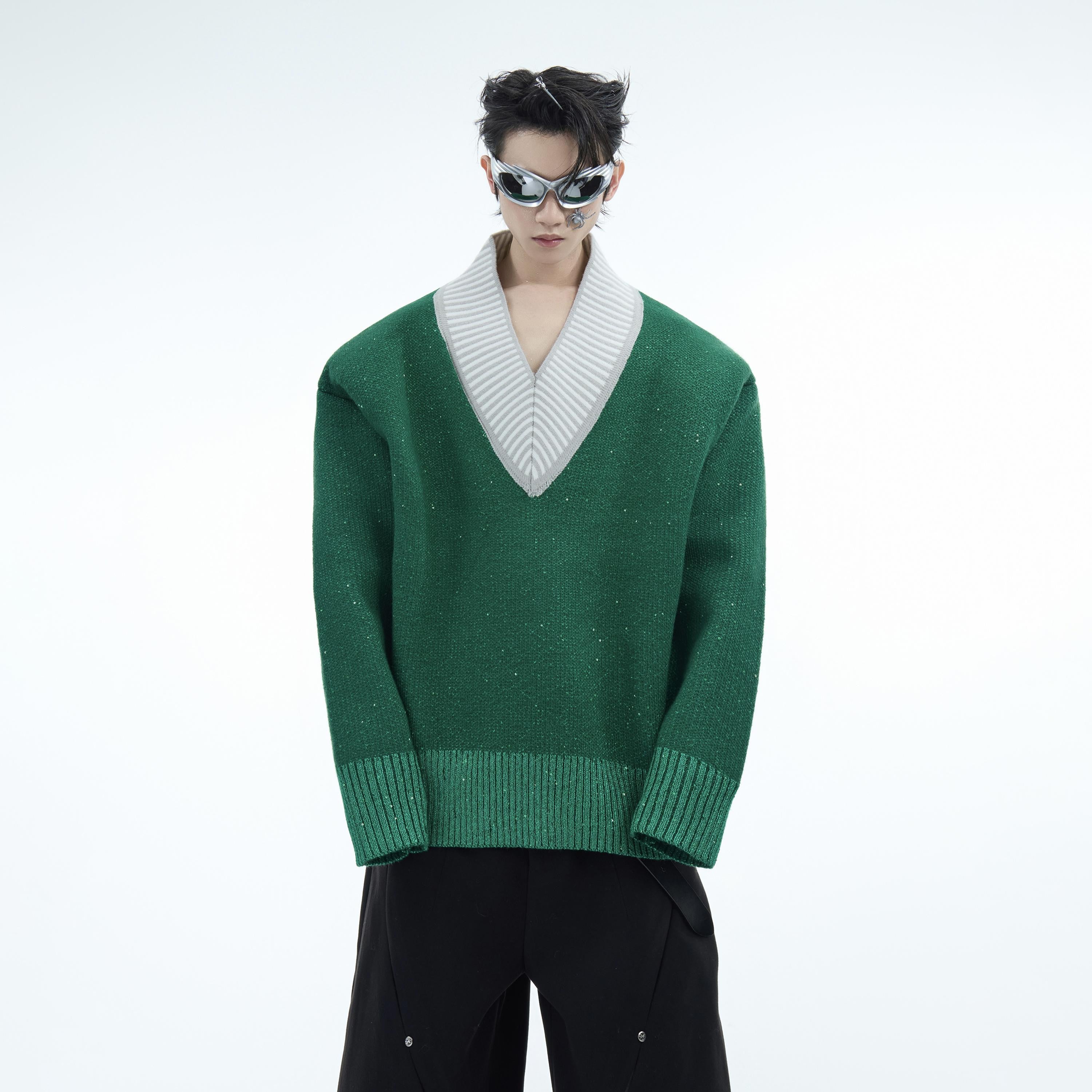 Sparkling V-neck Christmas sweater with festive colorblock design, perfect for holiday parties and winter fashion