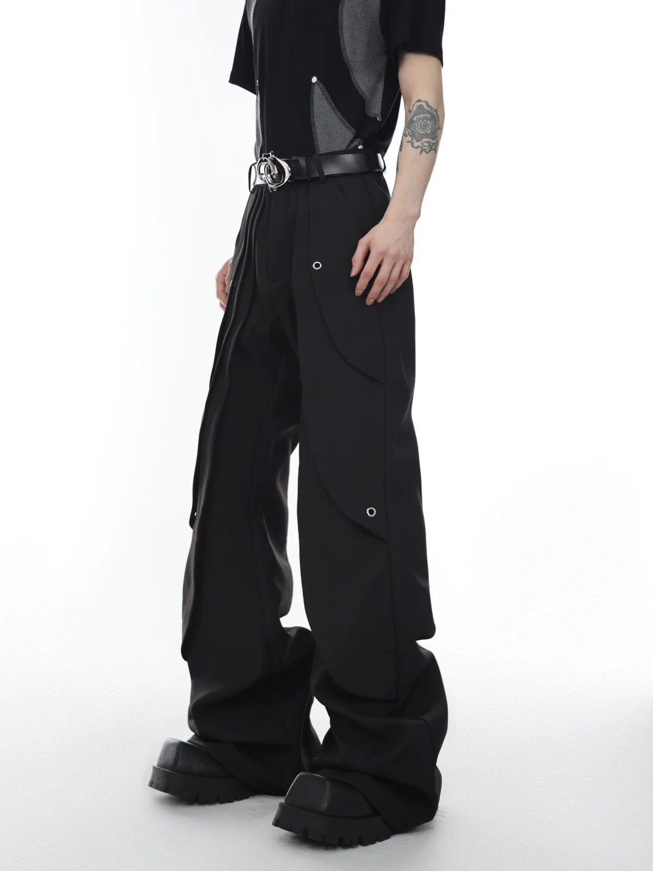 Handmade high waist black slim flare pants with deconstructed multi-panel design for a street-sophisticated look