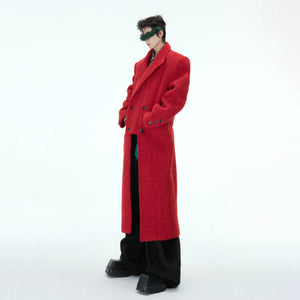 Side view of the deconstructed wool coat featuring an innovative faux two-piece construction for urban style