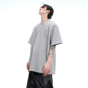 Side angle view showing the structured fit and crystal details of this statement streetwear tee