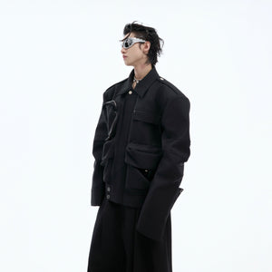 Close-up of the folded sleeves and raw edge detailing on this punk-inspired heavyweight streetwear jacket