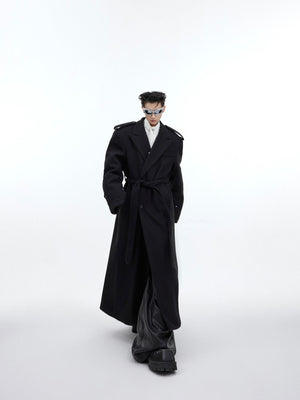 Side view of deconstructed British wool coat featuring oversized fit and premium polyester-wool blend