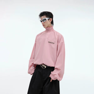 High-neck ruffle blouse with loose fit long sleeves, perfect for streetwear fashion with premium craftsmanship details