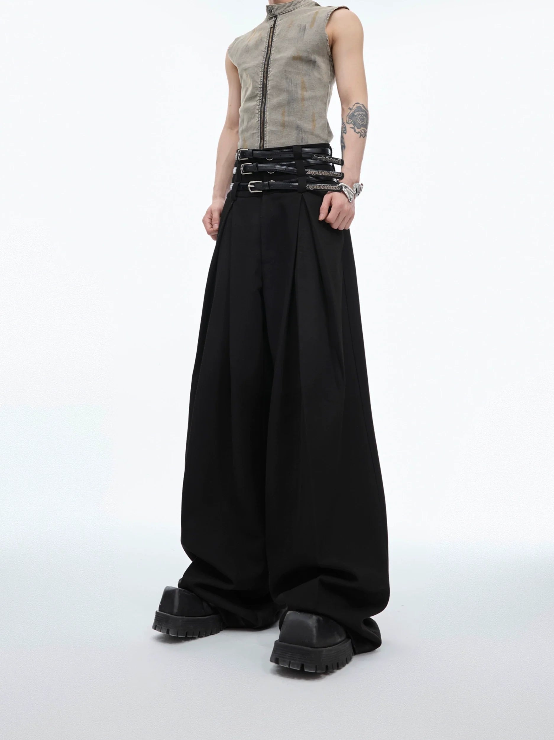 High-waist pleated wide-leg trousers with loose fit and innovative spliced belt design for streetwear fashion