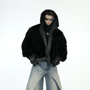 Model wearing distressed two-way hooded puffer jacket in oversized streetwear style front view