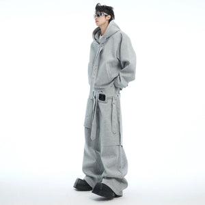 Side angle showing the unique detachable sash feature of this oversized streetwear hoodie set with metal print