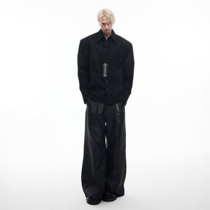 Fashion styling of avant-garde spinal bone shirt with deconstructed details and stand collar