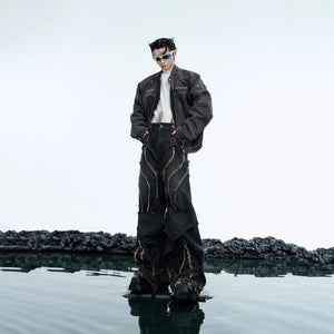 Front view of distressed loose fit jeans showcasing the raw hem detail and vintage-inspired wash