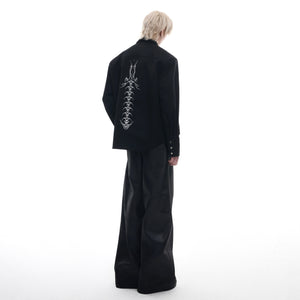 Side angle of edgy deconstructed shirt with stand collar and long sleeves for fashion-forward look