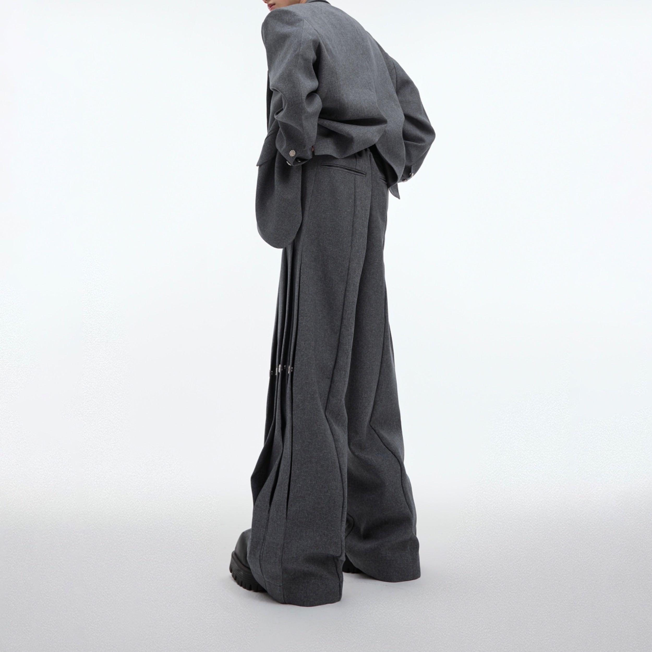 Loose fit streetwear pants with architectural seam detailing and deconstructed design elements