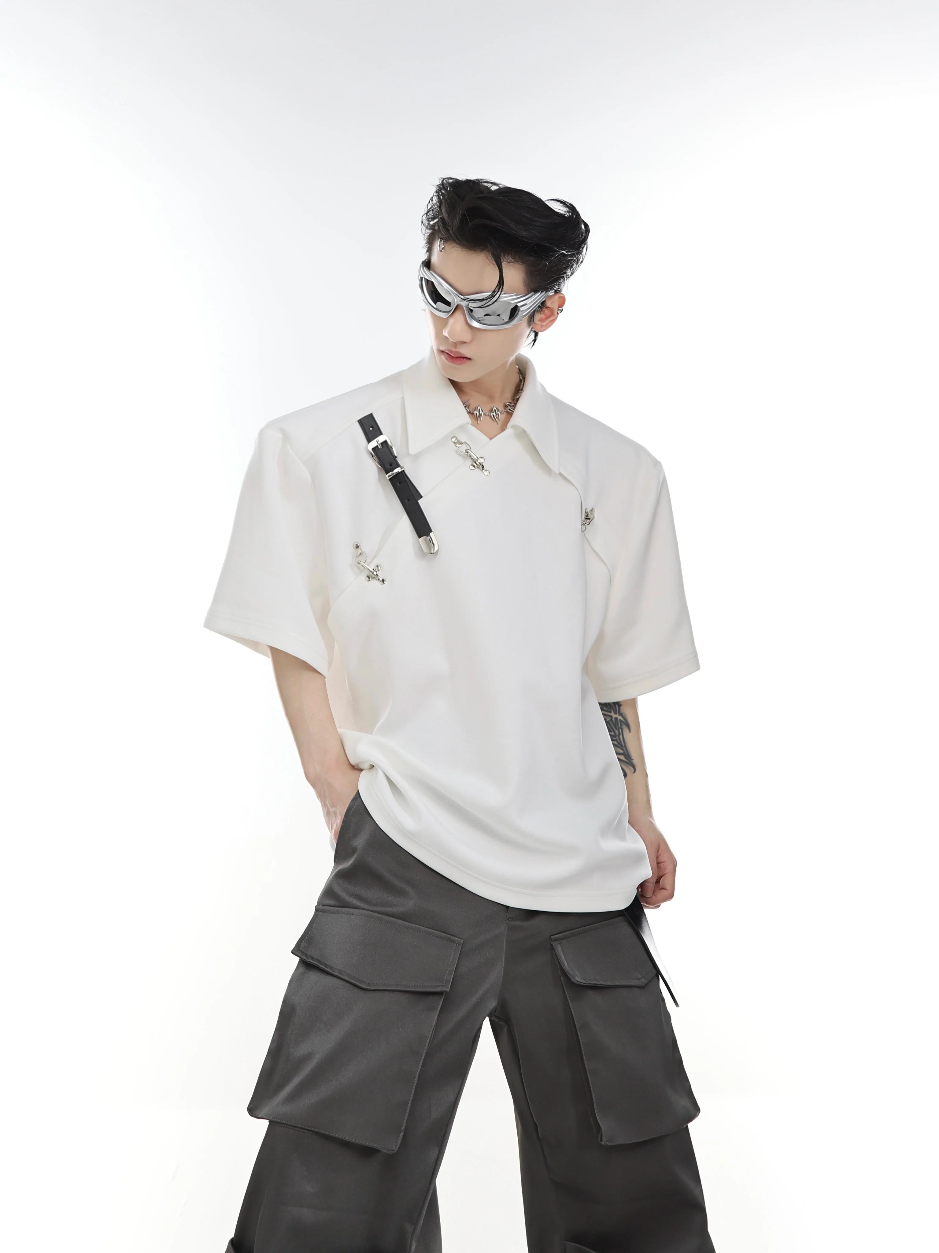 Deconstructed metal buckle polo shirt with asymmetric collar, perfect for streetwear fashion enthusiasts