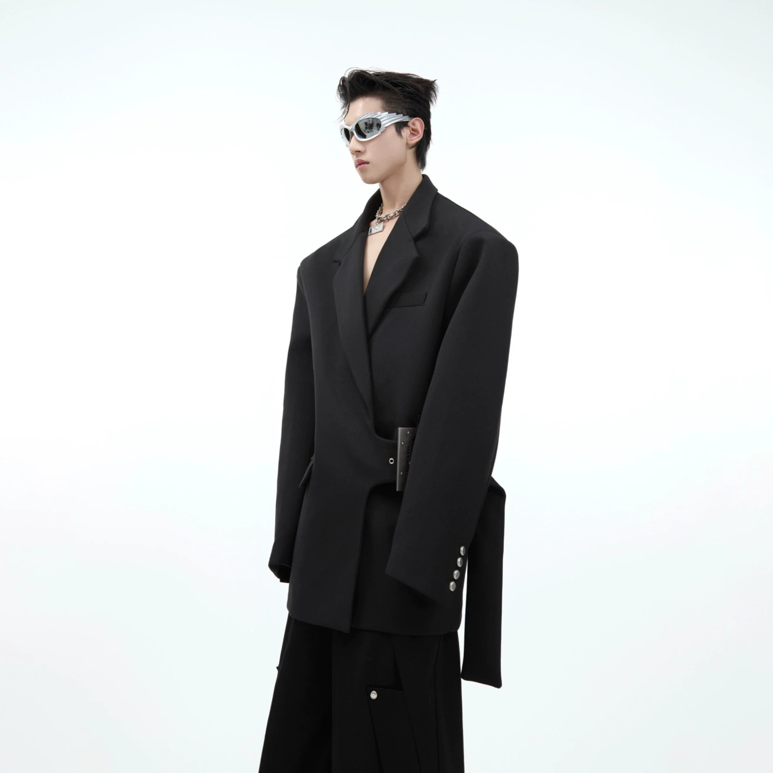Black silver streetwear blazer with metal buckle and shoulder pads, featuring an exaggerated suit silhouette