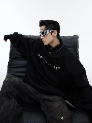 Front view of black oversized fleece hoodie with metal zip stand collar and padded shoulder design