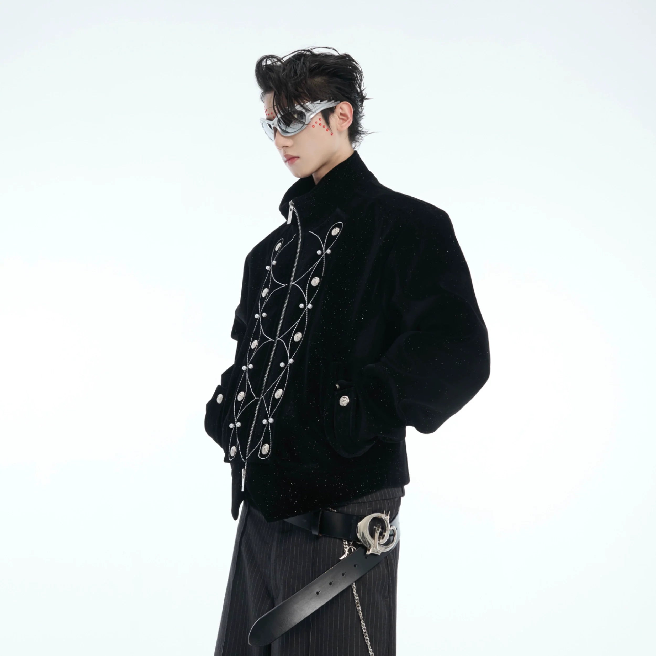 Front view of metallic-button cropped jacket with stand collar, featuring snake pattern and pearl embellishments