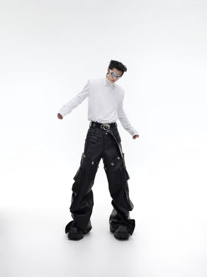 Detailed shot of the metallic ring accent on the high-neck long-sleeve shirt