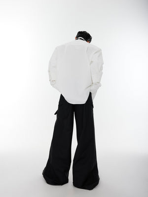 Modern oversized shirt with innovative no-tie double cuffs and relaxed drop shoulder silhouette
