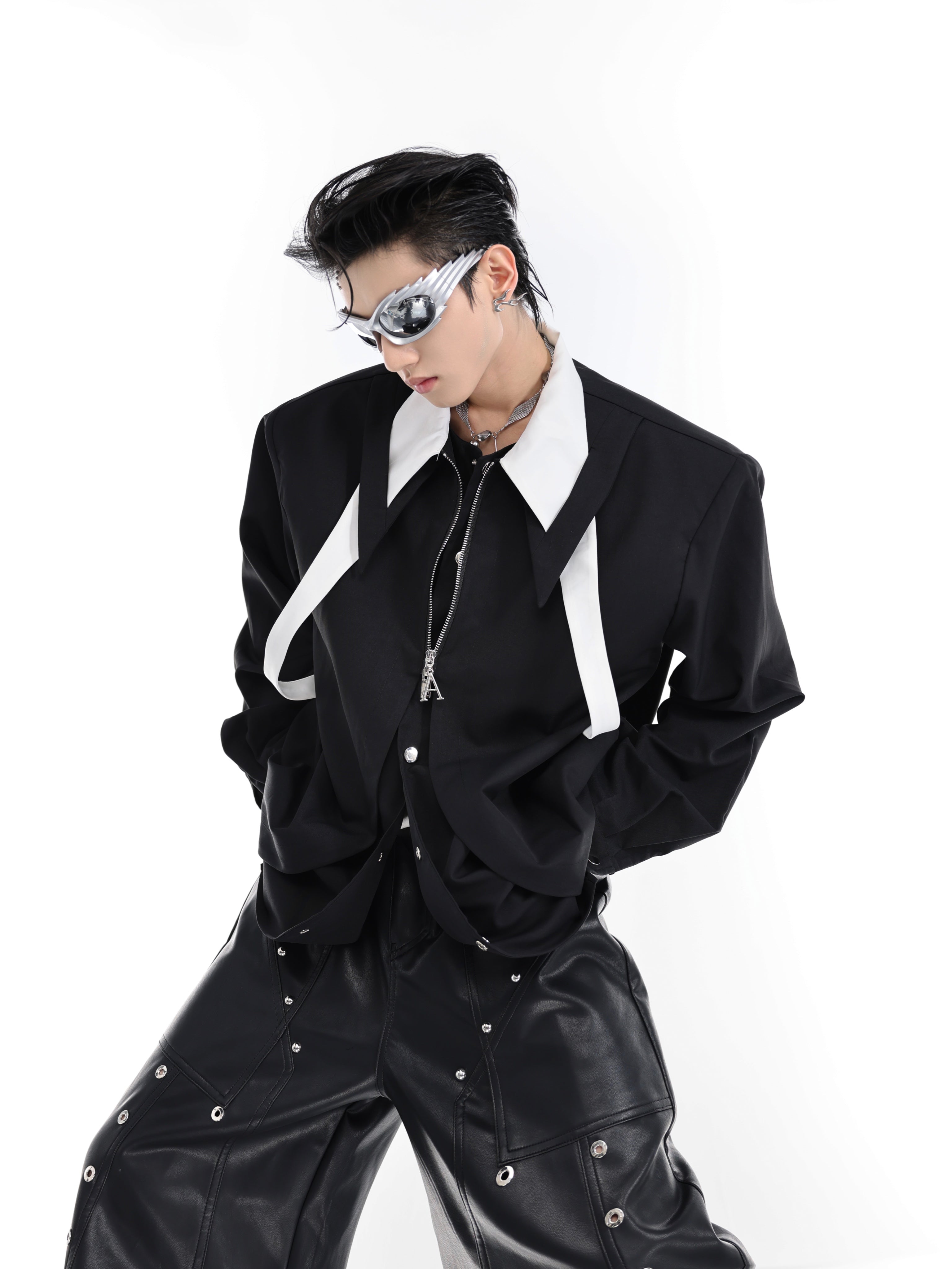 Fashion-forward open front shirt showing signature curved placket with double-layer construction for dimensional look