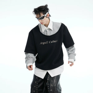 Front view of oversized color-block streetwear t-shirt showing bold patchwork design and long sleeves