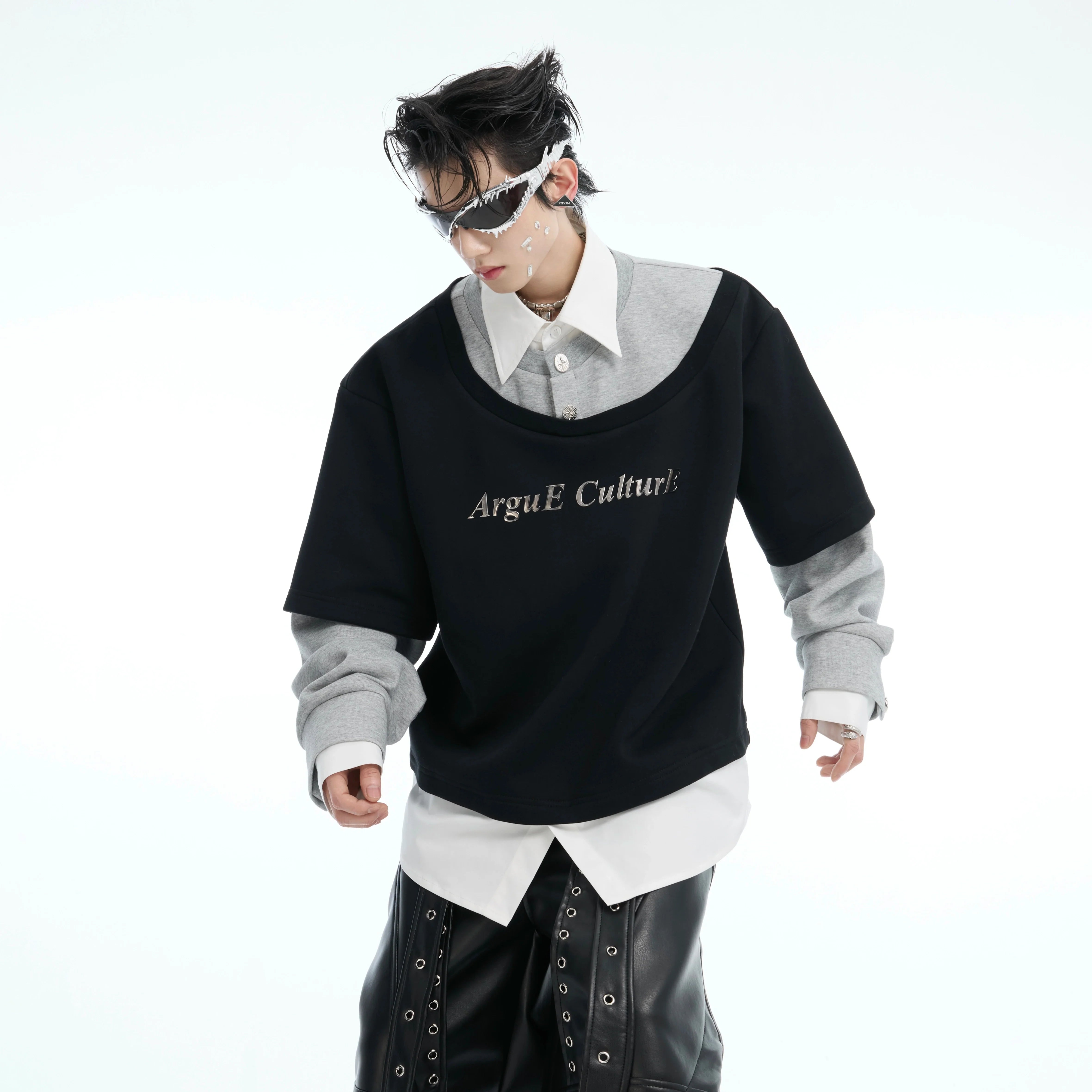 Front view of oversized color-block streetwear t-shirt showing bold patchwork design and long sleeves