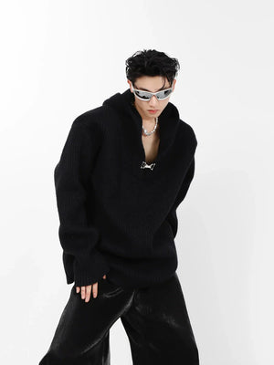 Front view of oversized hooded knit sweater showing premium fabric blend and streetwear style