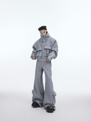 Close-up of unique deconstructed pocket details on warm fleece-lined oversized hoodie