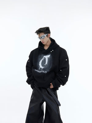 Side angle showing pearl embellishments on oversized graphic hoodie with cozy fleece interior