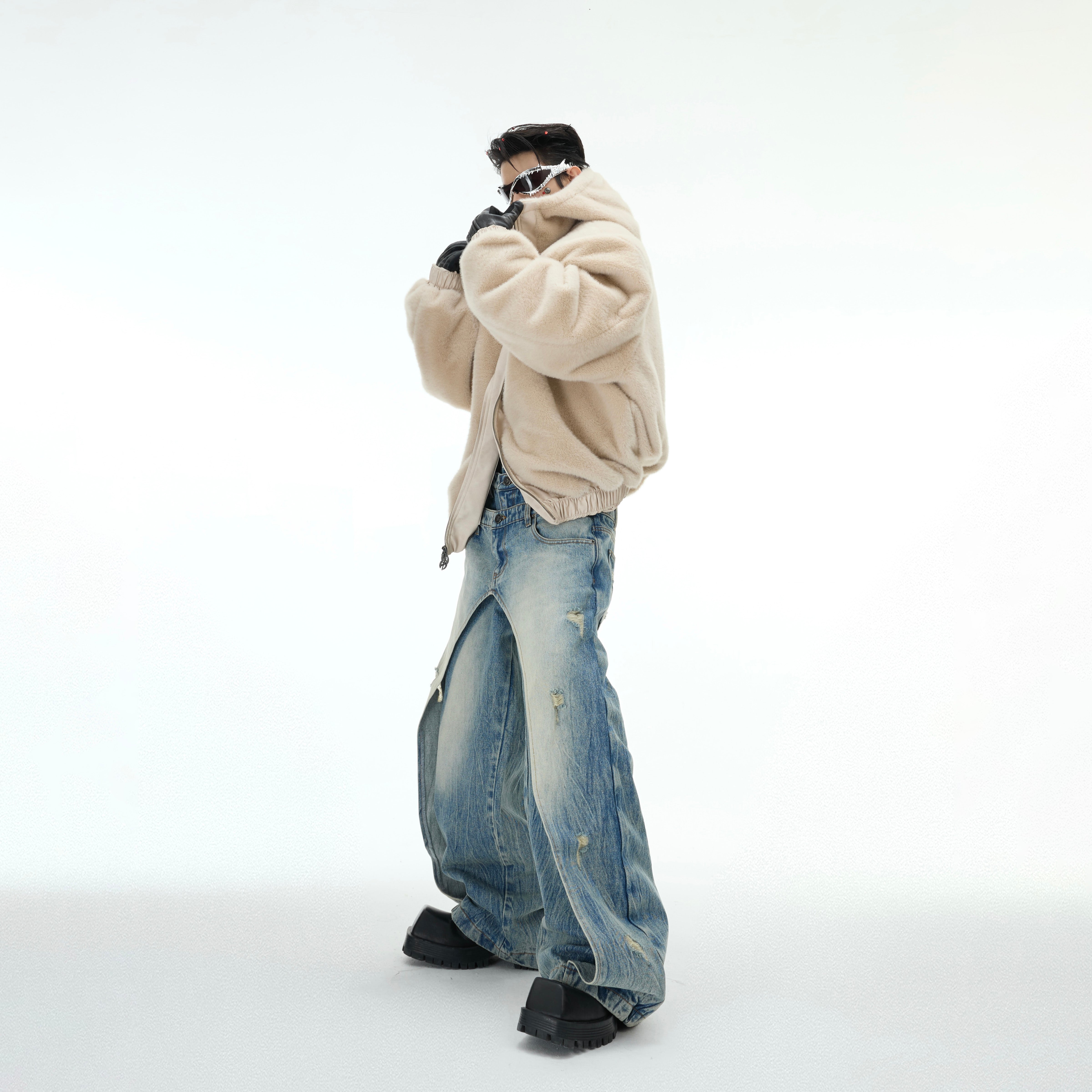 Urban oversized puffer coat showing plush fleece interior of reversible two-way streetwear jacket